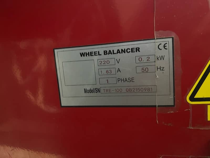 big red wheel balancer 6