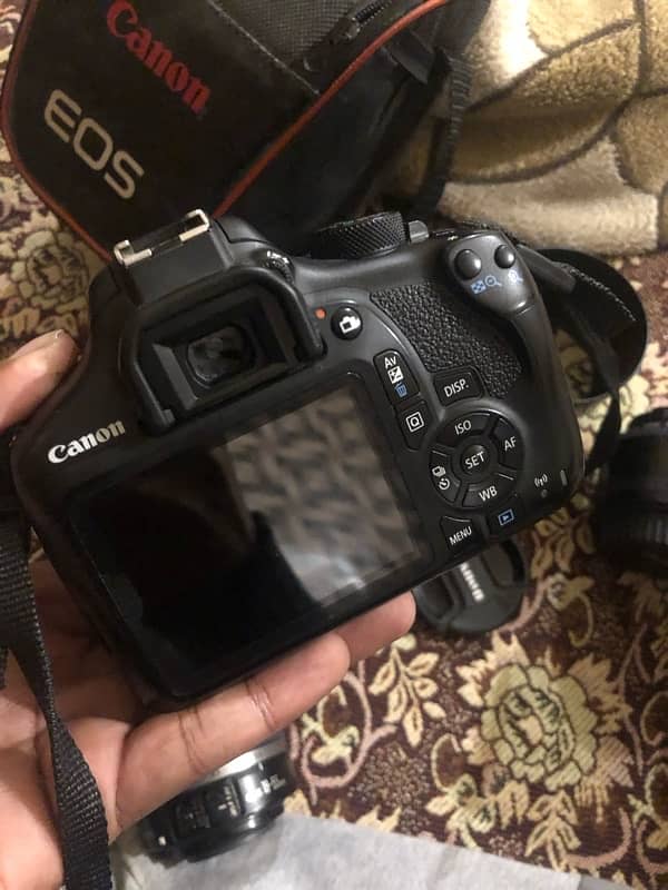 Canon 1300D DSLR with 18-55mm AF Lens & Yongnuo 50mm AF Lens 2