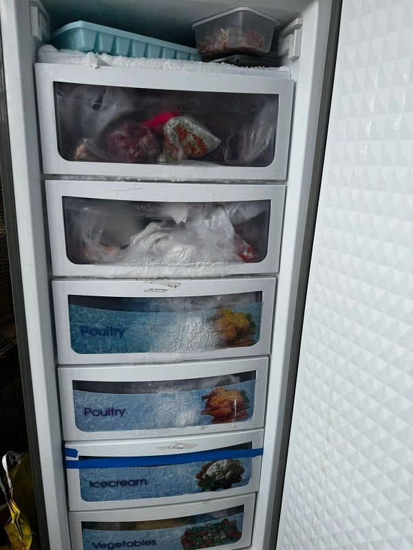 dawlance vertical freezer 0