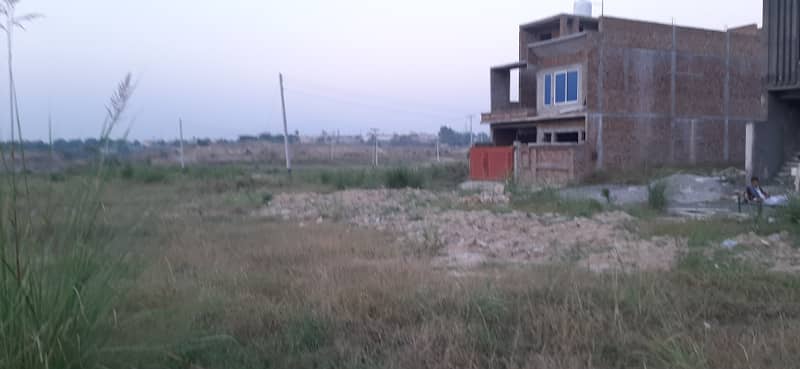 30 x 60 plot for sale and Exchange in Hill View Housing Society 0