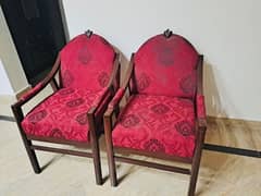 Two mehroon coloured chairs condition 10/10