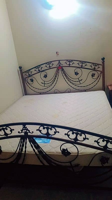 iron bed for sale with semi hard matress 0