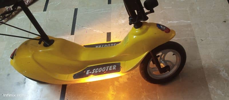 Kids electric scooty 5