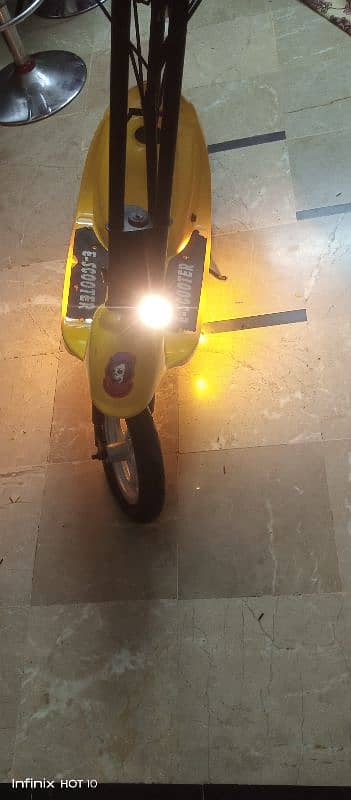 Kids electric scooty 7