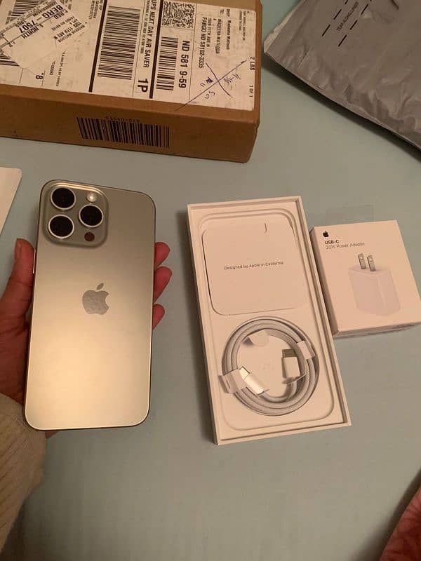 I Phone 15 pro max with box 256 gb,Natural Titanium, non JV,non active 1