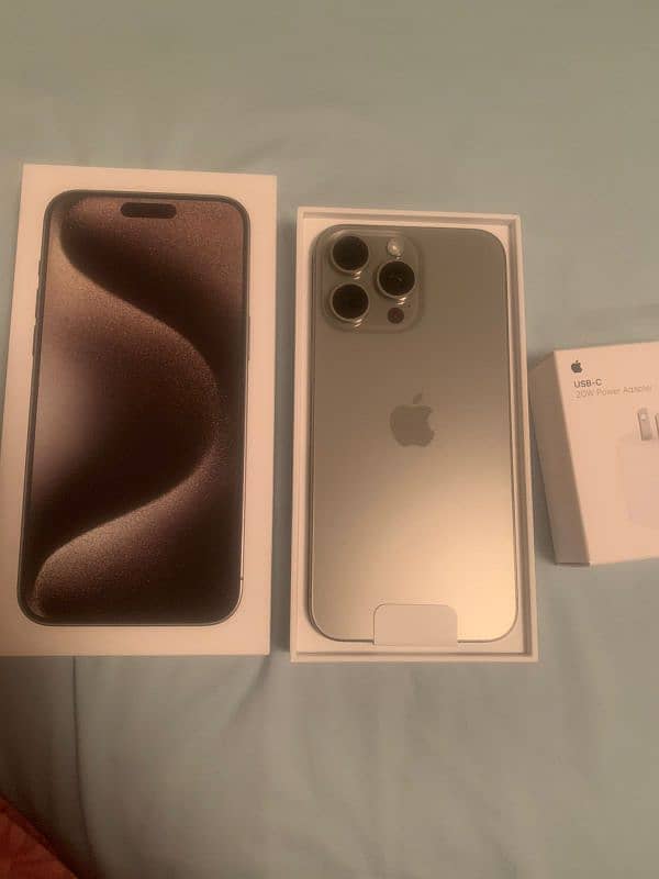 I Phone 15 pro max with box 256 gb,Natural Titanium, non JV,non active 3