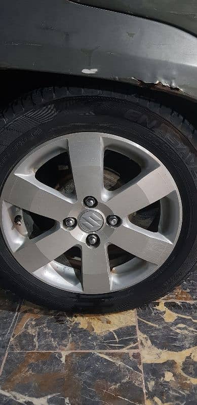 suzuki swift original alloy rims 0