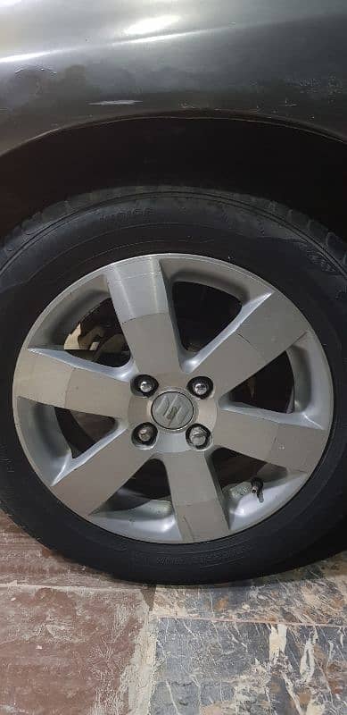 suzuki swift original alloy rims 2