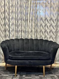 2 seater black queen shape sofa