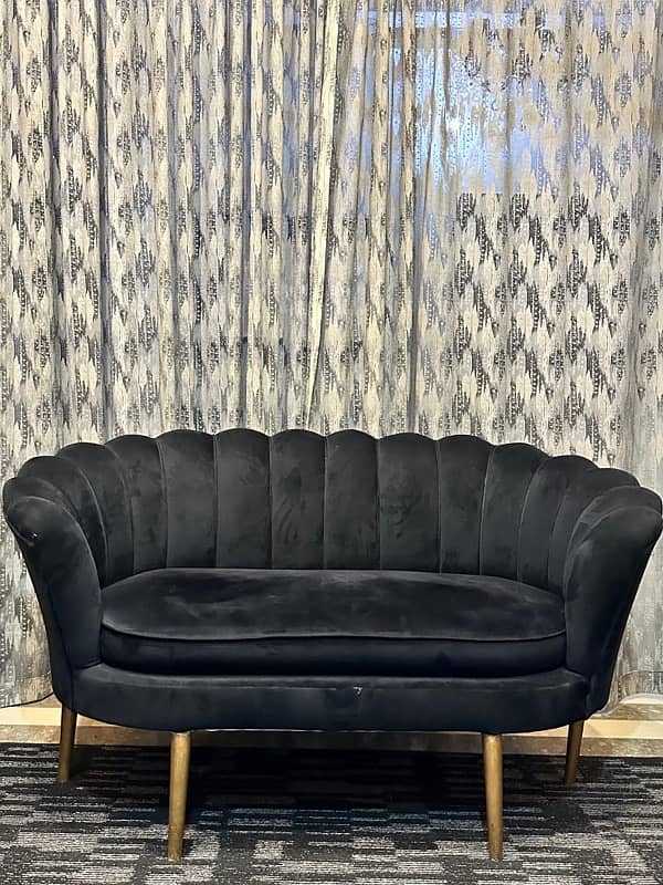 2 seater black queen shape sofa 0