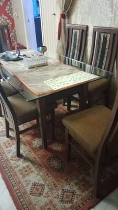 Almost new dining table with 6 chairs