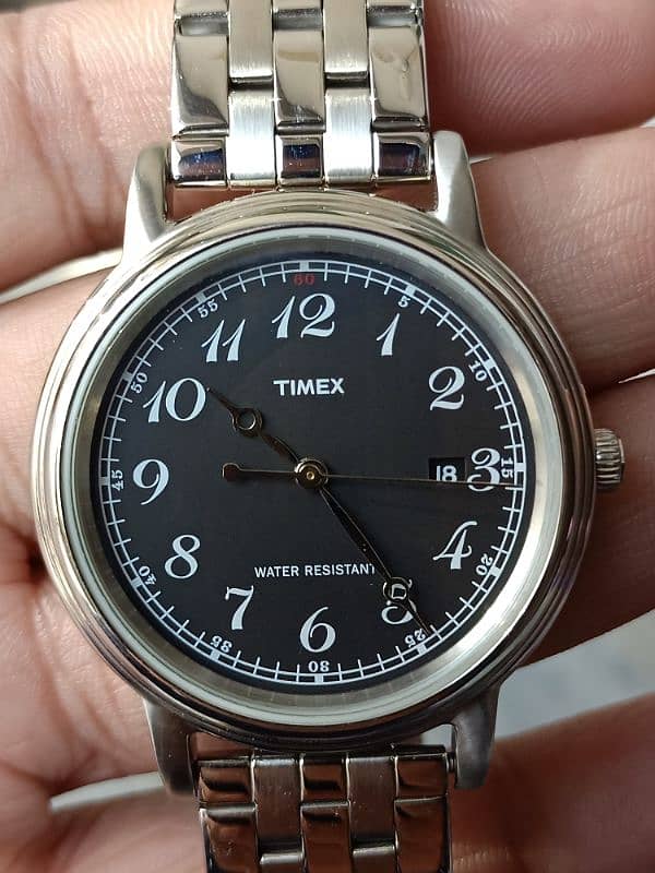 TIMEX 1