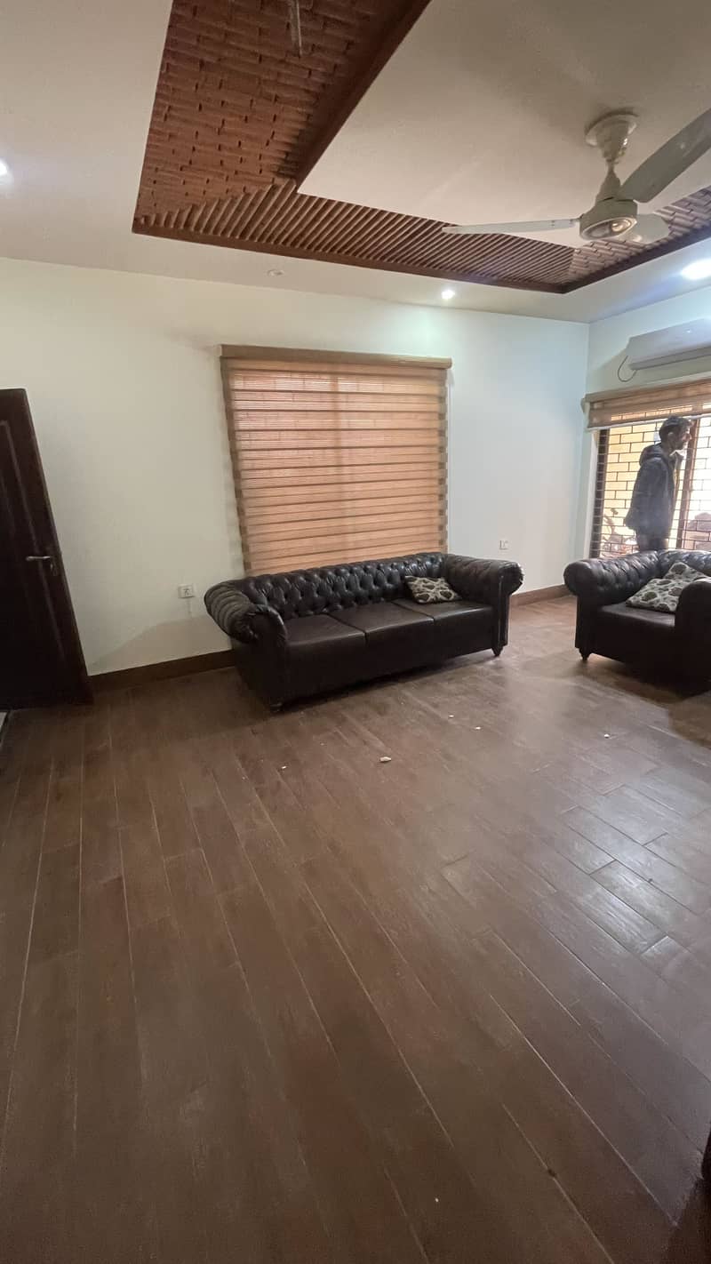 1 kanal lower portion for rent in model town best location with basement hall for family or for use silent ofc 13