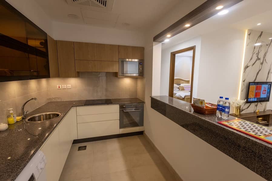 BRAND NEW 1 BED SEMI FURNISHED APARTMENT AVAILABLE FOR SALE REASONABLE PRICE 8