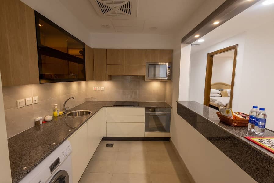 BRAND NEW 1 BED SEMI FURNISHED APARTMENT AVAILABLE FOR SALE REASONABLE PRICE 9