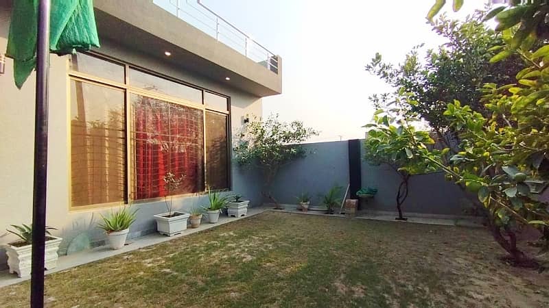 A Beautifully Designed Prime And Hot Location 1 Kanal Single Storey House For Sale In AWT Phase 2, Block E-1 11