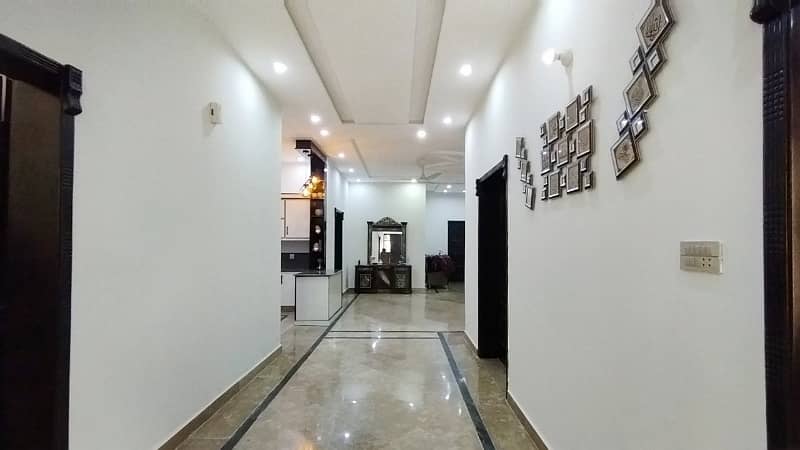 A Beautifully Designed Prime And Hot Location 1 Kanal Single Storey House For Sale In AWT Phase 2, Block E-1 12