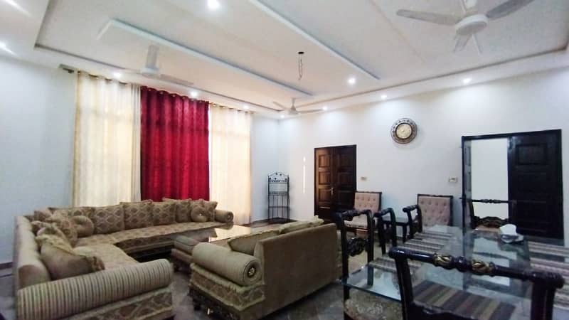 A Beautifully Designed Prime And Hot Location 1 Kanal Single Storey House For Sale In AWT Phase 2, Block E-1 13