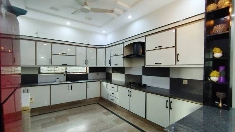 A Beautifully Designed Prime And Hot Location 1 Kanal Single Storey House For Sale In AWT Phase 2, Block E-1 22