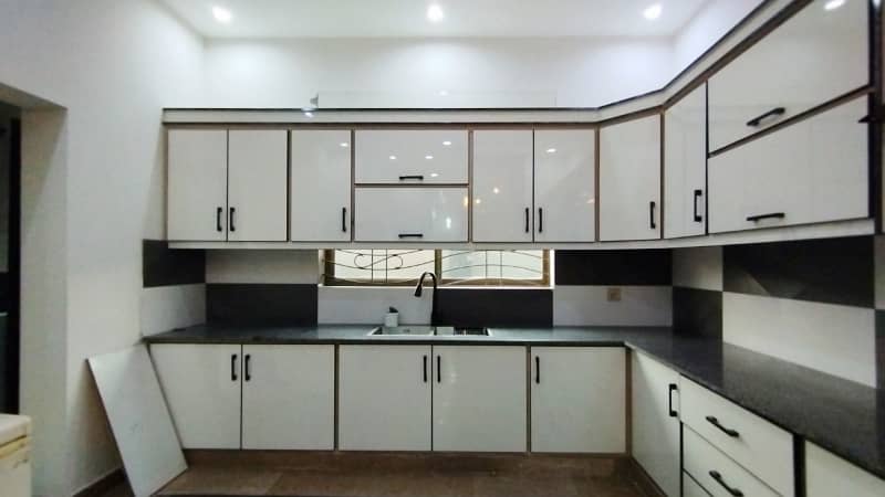 A Beautifully Designed Prime And Hot Location 1 Kanal Single Storey House For Sale In AWT Phase 2, Block E-1 25