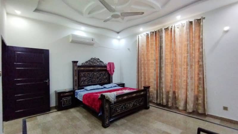 A Beautifully Designed Prime And Hot Location 1 Kanal Single Storey House For Sale In AWT Phase 2, Block E-1 28