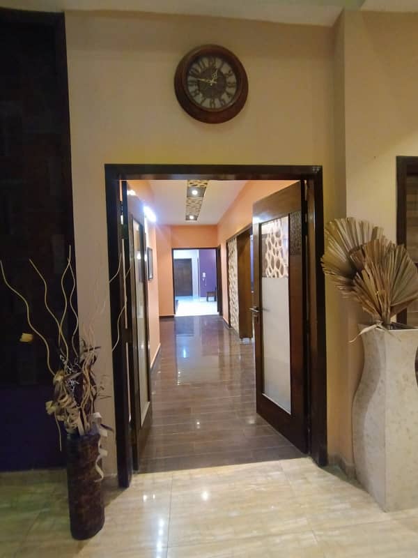 24 Marla Almost New Tile Flooring House Double Storey 5 Bed Attach Bath Double T. V Lounge Best For Two Brothers Resident It's Located To PIA Society D Block 12