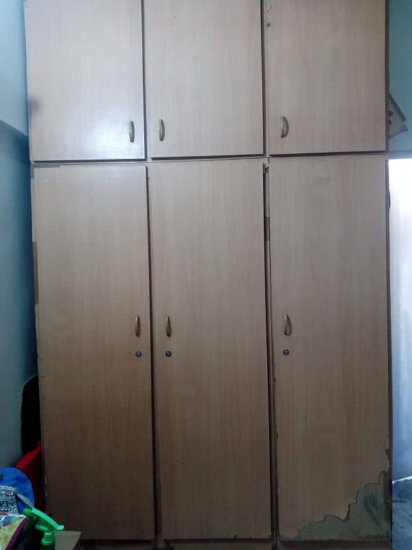 3 door tall cupboard 0