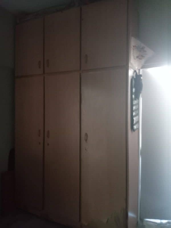 3 door tall cupboard 1