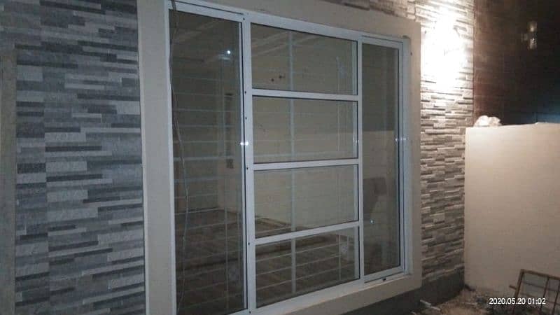 ALUMINIUM WINDOWS AND GLASS PARTITION 0