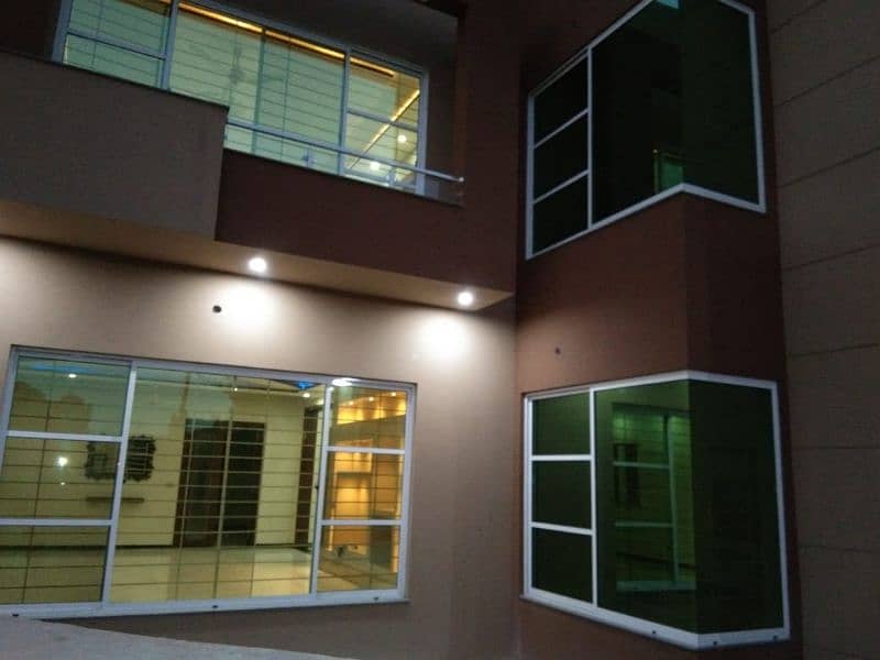 ALUMINIUM WINDOWS AND GLASS PARTITION 1