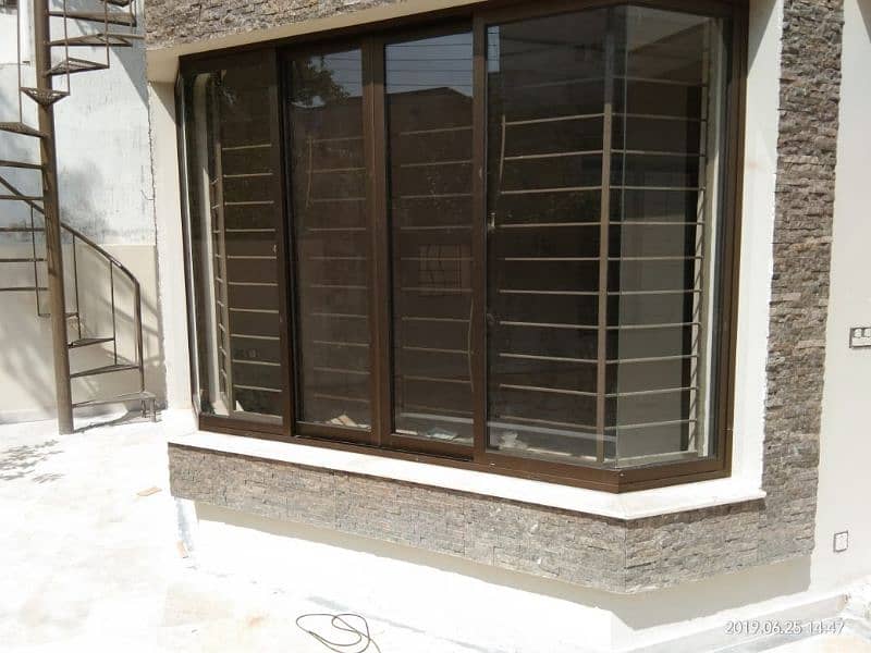 ALUMINIUM WINDOWS AND GLASS PARTITION 4