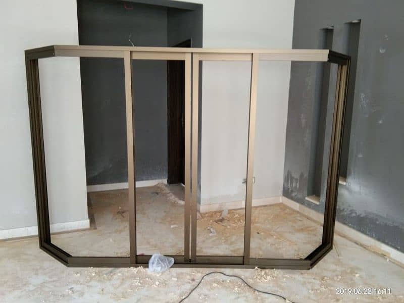 ALUMINIUM WINDOWS AND GLASS PARTITION 7