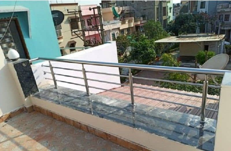 STEEL RAINING TERRACE IN GLASS AND STAINLESS 2