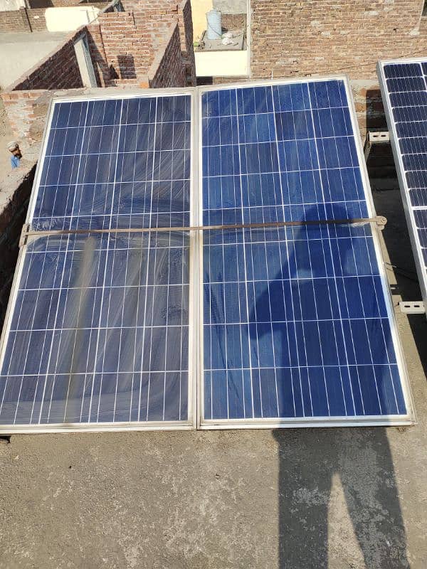 4 solar panels  2-150 watt and 2-250 watt with stands 1