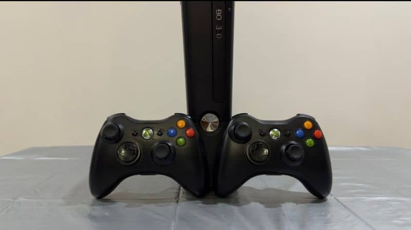 xbox 360 slim  with one wireless controller 6