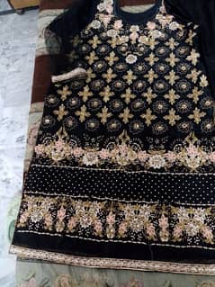 net dress havey embroidery stone work design amazing work