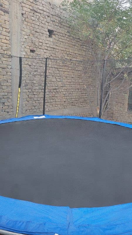 14 ft trampoline with extra mat 1