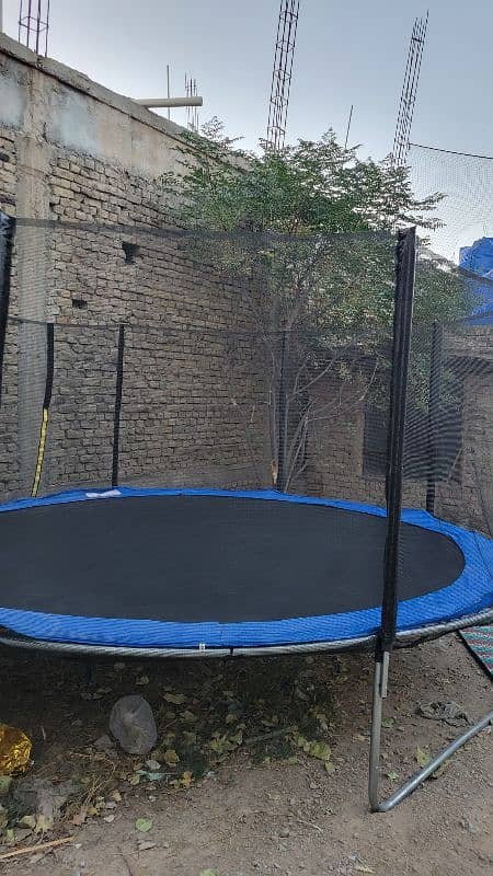 14 ft trampoline with extra mat 2