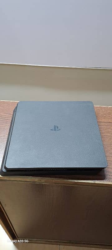 Barely used Ps4 with gamss and controllers 3