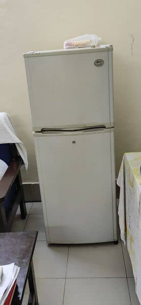 Medium sized LG fridge For Sale 1