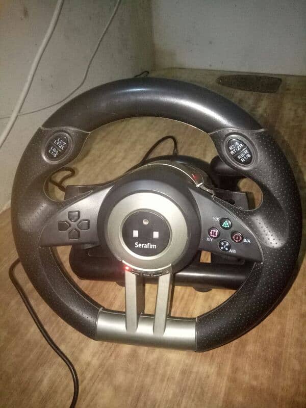 PXN V3 or serafim gaming steering wheel 1