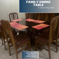 wooden dining table and chairs