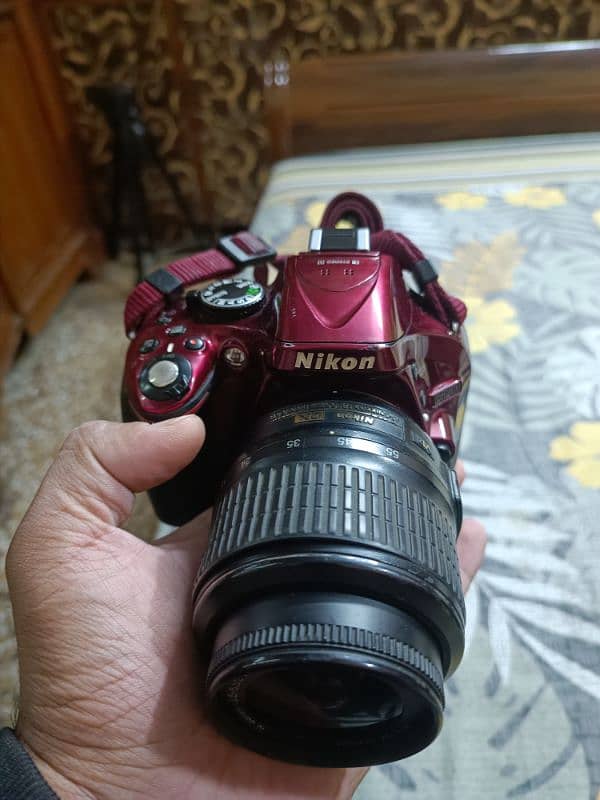 Nikon d5200 with 18/55mm Red product. 1