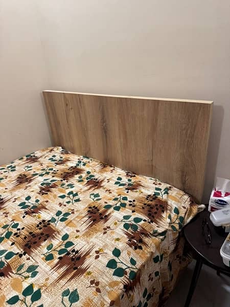 single wooden bed 0