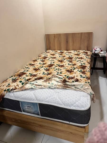 single wooden bed 1