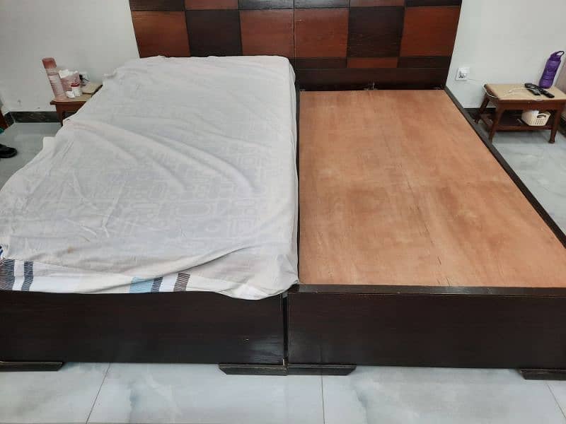 wooden bed single/ pair and one cushioned bed 2