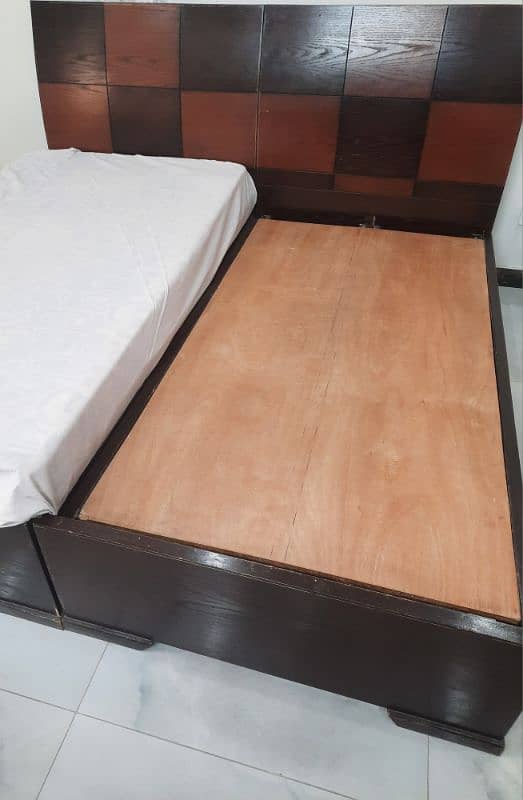 wooden bed single/ pair and one cushioned bed 3