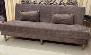 sofa bed in brown colour