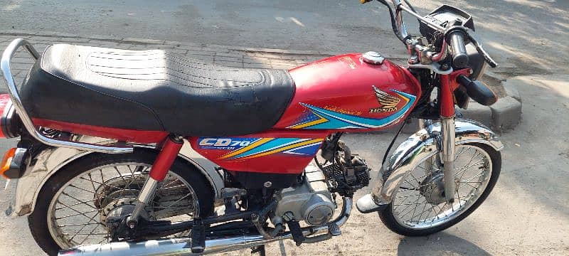 honda 70 condition apky samny h all ok h bike use m h 5