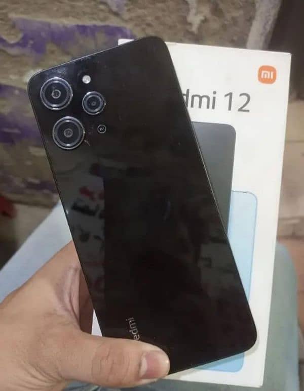 Redmi 12 new condition 10/10 8/128  6 month under warranty. 2